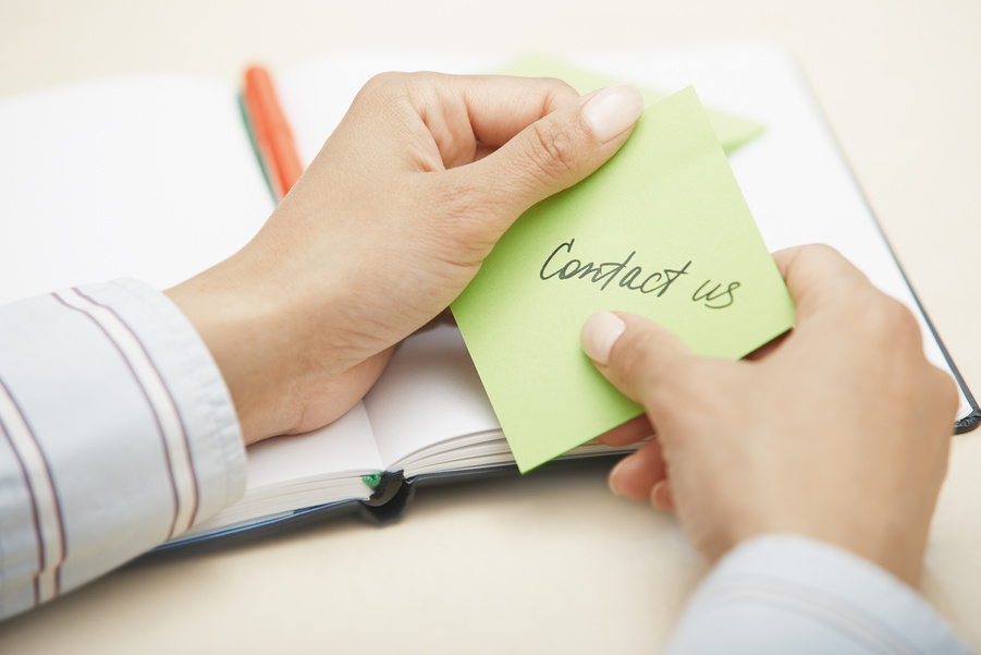 Contact us text on adhesive note