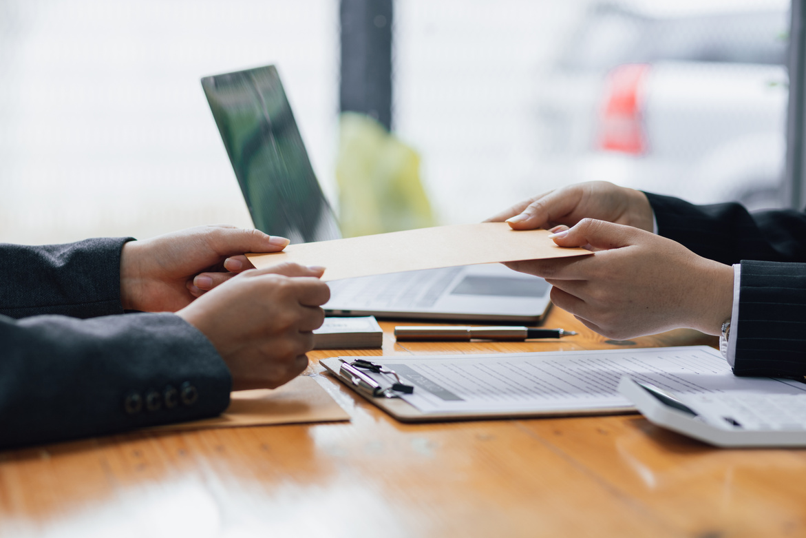 Businessperson Submitting Legal Documents